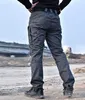 Pantaloni tattici militari da uomo Pantaloni SWAT Pantaloni multi-tasche Pantaloni merci Formazione Uomo Combatti Pantaloni esercito da combattimento Lavoro Uniformi di sicurezza 201027