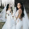 Vestidos de novia de sirena 2021 con manga larga de ilusión Dubai árabe Vestidos de boda de novia con espalda transparente sexy Tul con apliques de encaje Cour292L