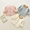 Frühling geborene Baby-Jungen-Mädchen-Pullover-Mäntel-Marken-Baumwollstrick-feste Strickjacke-Knopf-Jacken-Säuglings-Outwear-Tops 210429
