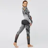 Yoga Outfit Seamless Camouflage Set Sport Fitness Pantaloni a vita alta per il sollevamento dell'anca Tute a maniche lunghe Allenamento Leggings da palestra per le donneYoga