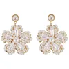 fleur blanche pendants d'oreilles