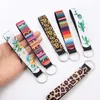 Keychains Trendy Sunflower Leopard tryckt nyckelring för kvinnor Key Chain Lanyard Long Hanging Strap Holder Rings smycken Tillbehör1