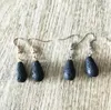 boucles d'oreilles de lustre en pierre