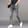 Męskie dżinsy całe 2021 Jeansowa modna marka Slim Feet Casual Long Pants Korean Style Summer Smoke Grey Pencil227y