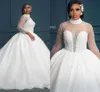 Afrikaanse bruidjurken 2022 Arabische Dubai Luxe Sequin Bridal Trouwjurken Parels Illusie Hoge Hals Nieuwe Robe de Mariee