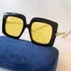 Zonnebrillen Designer Persoonlijkheid Zwart Fre Yellow Lens Woman Sunglasses Classic Fashion 0722S Glazen Polycarbonaatplaat vierkant 0722 E Box 2y7d