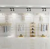 Espositore per negozio di abbigliamento combinazione da pavimento oro scaffale per negozio di stoffa da donna appendiabiti in ferro