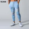 Novo Design calças dos homens da aptidão Calças justas Outono Elastic Musculação Pant Workout trilha calças fundo Homens Joggers Sweatpants