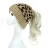 Femmes Leopard Tricoted Ponytail Caps Fashion Criss Croiftail Pony Beanie hiver laine chaude Casual Knitting Hat Party Party Supply RRA5702018
