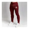 Męskie dnie dna Joggers Spodnie sportowe Siłownie Cienka fitness Skinny Spodnie Elastyczność Bieganie Mężczyźni Solid Casual Pantalon 201221