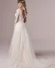 Långärmad bröllopsklänning med korsett Låg bakgrund Golvlängd Lace Appliques Boho Brudklänningar Vit Tulle Organza Graceful V-Neck