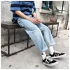 Jeans da uomo Pantaloni larghi in denim elasticizzato da uomo 2021 Autunno Inverno Streetwear Pantaloni larghi strappati strappati a gamba larga per uomo1