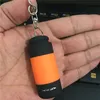 12 색 휴대용 미니 손전등 USB 충전식 키 체인 LED 작은 손전등 강한 빛 방수 여행 전기 토치