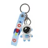 Llaveros Lanyards Dibujos animados creativos PVC Muñeco de goma suave Astronauta Metal Decorativo Mochila Colgante Adornos simples