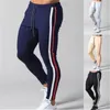 Hommes rayé Zipper pantalons de survêtement mode tendance sport Gym crayon pantalon concepteur mâle automne nouveau cordon décontracté droit maigre pantalon