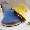 Sombreros de ala ancha Sol para mujeres Cuenca Chapeau Sombrero de cubo Hombres Sonrisa Bordado Hip Hop Pescador Cap Panamá Bob Caps Unisex