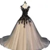 Robe de mariée gothique Robe de mariée Sheer Col Sans manches Dentelle Appliques Tulle Corset Robes de mariée Train Cour Mer Princess Robe Trail Vestido de Novia