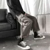 Lastbyxor män streetwear hip hop byxor lös koreansk stil fotled längdbyxor overall elastiska midja svart grå techwear h1223