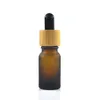 essential oil glass dropper bottle with bamboo lid bamboo serum bottle frosted green blue amber clear 10ml 15ml 20 30ml