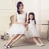 Mère fille robes dentelle fleur arc princesse robe de mariée mère et fille vêtements maman maman et bébé tutu robes blanc lj201109
