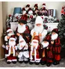 År juldekorationer för hemma elektrisk leksak med musik 14 i saxofon som spelar jultomten vita fötter med ljus 201201