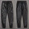 TSINGYI Moto Biker Pantaloni in pelle sintetica Pantaloni da uomo Pantaloni Harem Vita elastica Tasche con cerniera Nero Streetwear Abbigliamento uomo slim fit