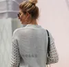 Frauen Pullover Weiß Aushöhlen Herbst Casual Dünne Kurze Strick Tops Oansatz Weibliche High Street Chic Jumper