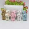 7cm / 2.8 tum x20pcs ny söt mini plysch teddybjörn med halsduk slips fylld djur plysch mjuk leksak söt docka present diverse färg