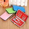 Hot 7 pcs Nail Clippers Kit Scissors Tweezer Knife Ear pick Utility Manicure Set Tools Random Colors DHL Free Shipping