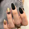 False Nails 24 PCS /箱の偽の爪のアーモンドの黒の金のデザインの人工的なバレリーナの偽物が付いている接着剤のフルカバーの釘のヒントを押す220225