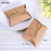 100 PCS LOT CUTE KRAFT PACK PACEDAL CANDY BOX FEVORS FAVORS GIFT SANDY BOXES with Tags Home Party Supply T200115192T