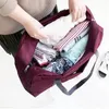 Novo Nylon Dobrável Saco de Viagem Unisex Grande Capacidade Saco Bagagem Mulheres Impermeáveis ​​Bolsas