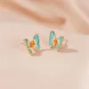 韓国の油絵の蝶スタッドのイヤリングメタルファッション動物の翼の耳の耳滴の女性のビジネスパーティーギフトイヤリングジュエリー