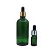 Flacone contagocce per imballaggio cosmetico in vetro verde Anello in argento dorato Top in Rebber nero Fiale ricaricabili per olio essenziale cosmetico vuoto 5ml 10ml 15ml 20ml 30ml 50ml 100ml