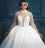 Afrikaanse bruidjurken 2022 Arabische Dubai Luxe Sequin Bridal Trouwjurken Parels Illusie Hoge Hals Nieuwe Robe de Mariee