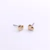 New Classic Symmetrical heart earrings Wholesale Gold color studs earrings for women