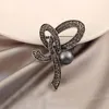 Båge broscher för kvinnor klänning kappa cardigan rhinestone pärla brosch stift vintage broscher mode smycken eleganta tillbehör