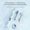 Irrigadores orales Carga inalámbrica Blanco Impermeable IPX8 Pantalla LCD 6 modos con 10 cabezales de cepillo de repuesto Cepillo de dientes eléctrico sónico para adultos