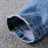 Mäns jeans sokotoo fågel broderade målade rippade streetwear hål patchwork stretch denim pants1