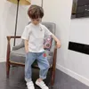 キッズガールズの男の子のためのブルーデニムパンツウエストジーンズ2021ベビーズボンのための春の幼児の固形色TOPS3482645