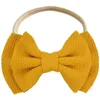 Baby Headbands Barn Huvudband Baby Bow Knotted Hårband Solid Färg Elastisk Hårband DHL Gratis Frakt