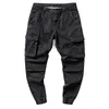 Męskie dżinsy Projektant mody Mężczyźni Duża kieszeń Dorywczo Kombinezony Cargo Spodnie Wysokiej jakości Streetwear Kolor Khaki Hip Hop Joggers Spodnie