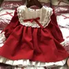 röda klänningar för babyflickor