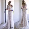 2021 Vestidos de noiva de renda mangas curtas Uma linha V Voltar scalloped pescoço varredura de trem fita feita sob encomenda feita por praia vestido de casamento vestido de novia