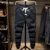 Plus maat 5xl 6xl 7xl Men's Black Blue Harem Jeans Herfst New Streetwear Fashion Stretch denim broek mannelijke merk broek 201123