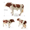 Simulação de vaca Fazenda de bovinos de bovinos estatuetas de boi modelo DIY decoração de casa miniatura Acessórios de decoração de jardim de fadas de fadas Moderno LJ200904