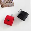 Fashion Stylist Airpods Case Backpack Style 4 Colors Pacchetto Airpods con motivo a triangolo invertito con portachiavi