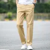 Весенние летние брюки мужчины мода мода бизнес растягивает мужские брюки чинос. Случайные черные хлопковые брюки Мужчина Pentalon Homme Mens 40 42 201128