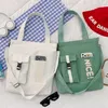 30 Stück Messenger Bags Damen Canvas Briefdrucke Beutel Reißverschluss Handtasche