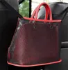 Kvadrater Vikbara väskor Mesh Cloth Net Pocket Reticular Sacks Reds Black Car Chair Multi Funcless Folkfylld 7 5kn L2